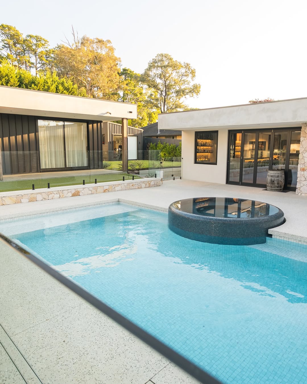 Luxury pool and spa with terrazzo surround